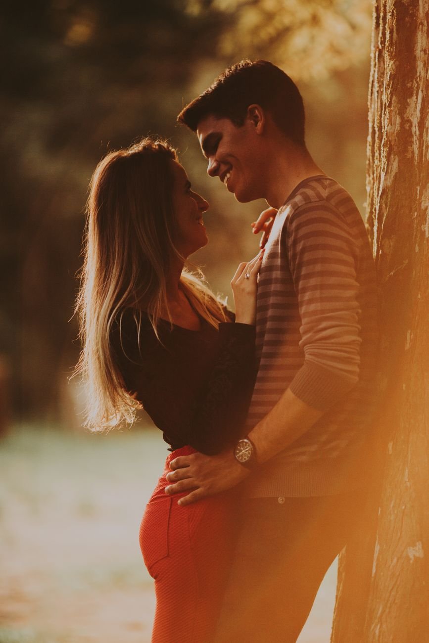 woman standing in front of a man