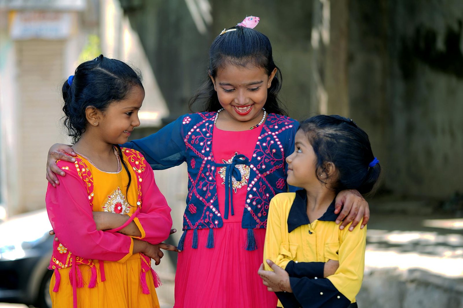 smiling girls in colorful clothes
