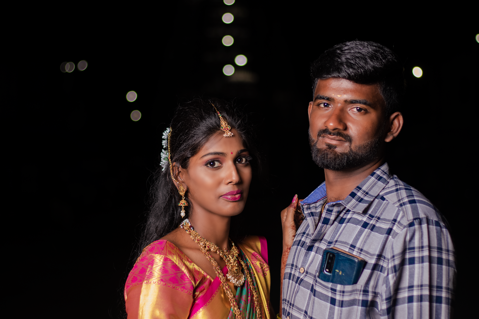 a couple standing close to each other