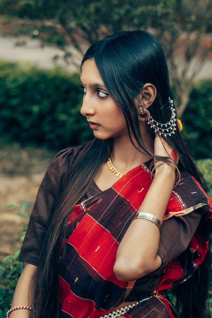 portrait of young woman in traditional saree