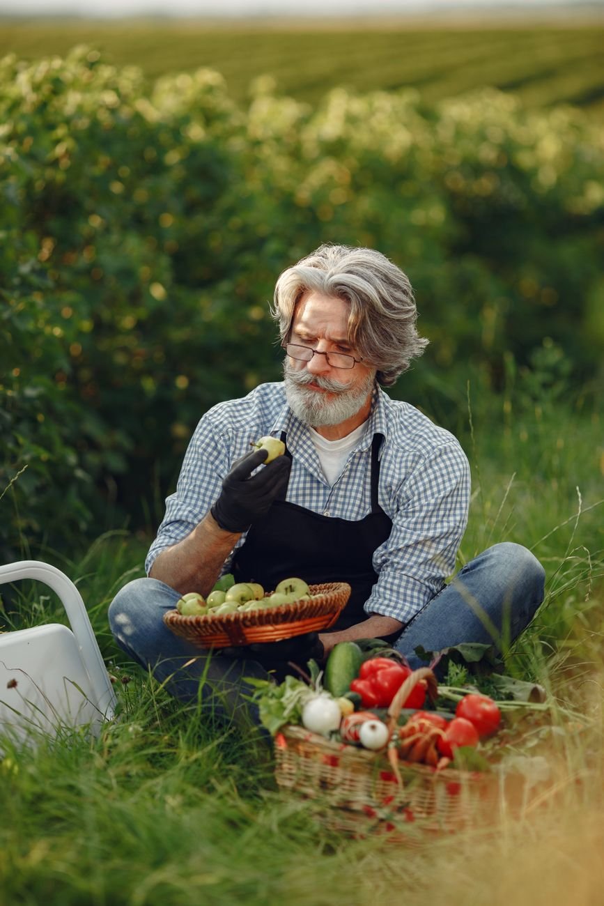 portrait of elderly man on countryside