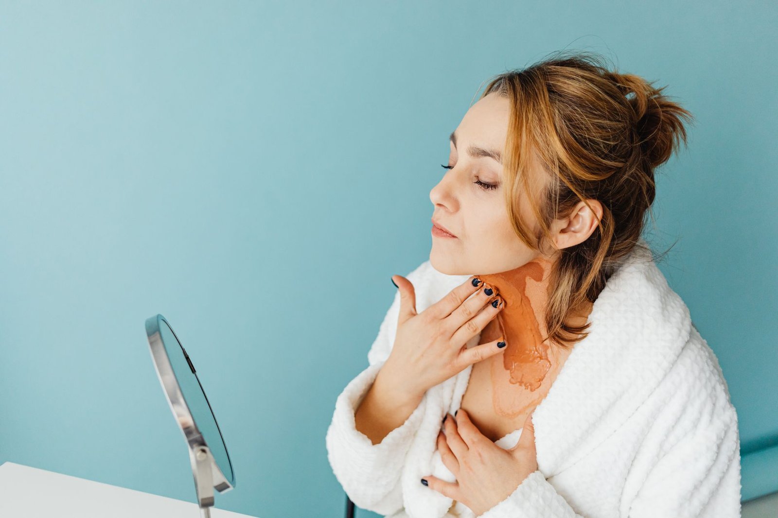 woman using a skincare product