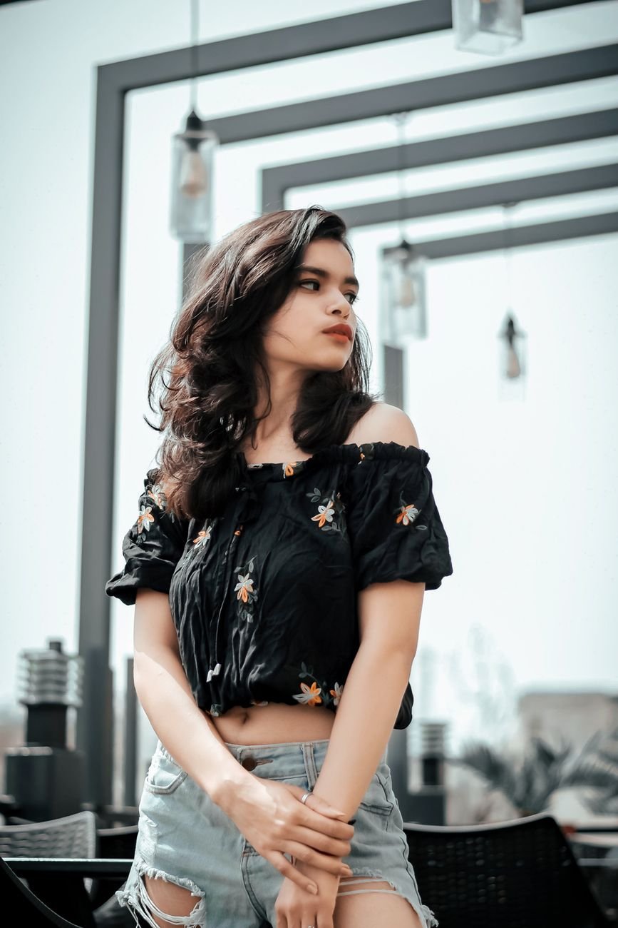 young brunette woman in casual clothing