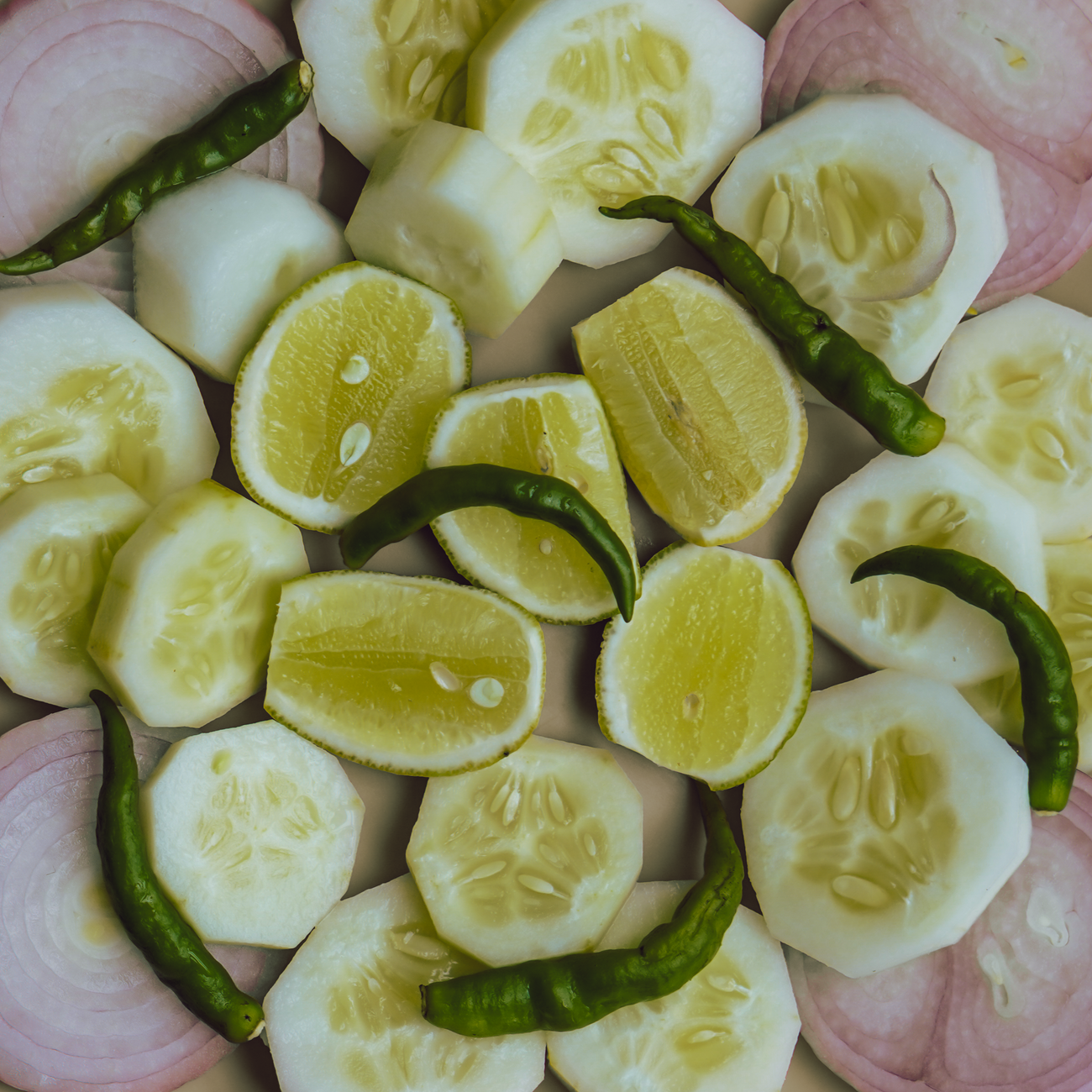 sliced cucumber and green vegetable