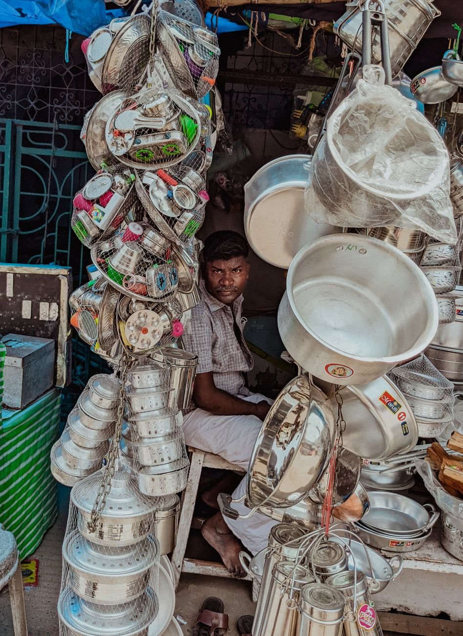 man selling kitchenware