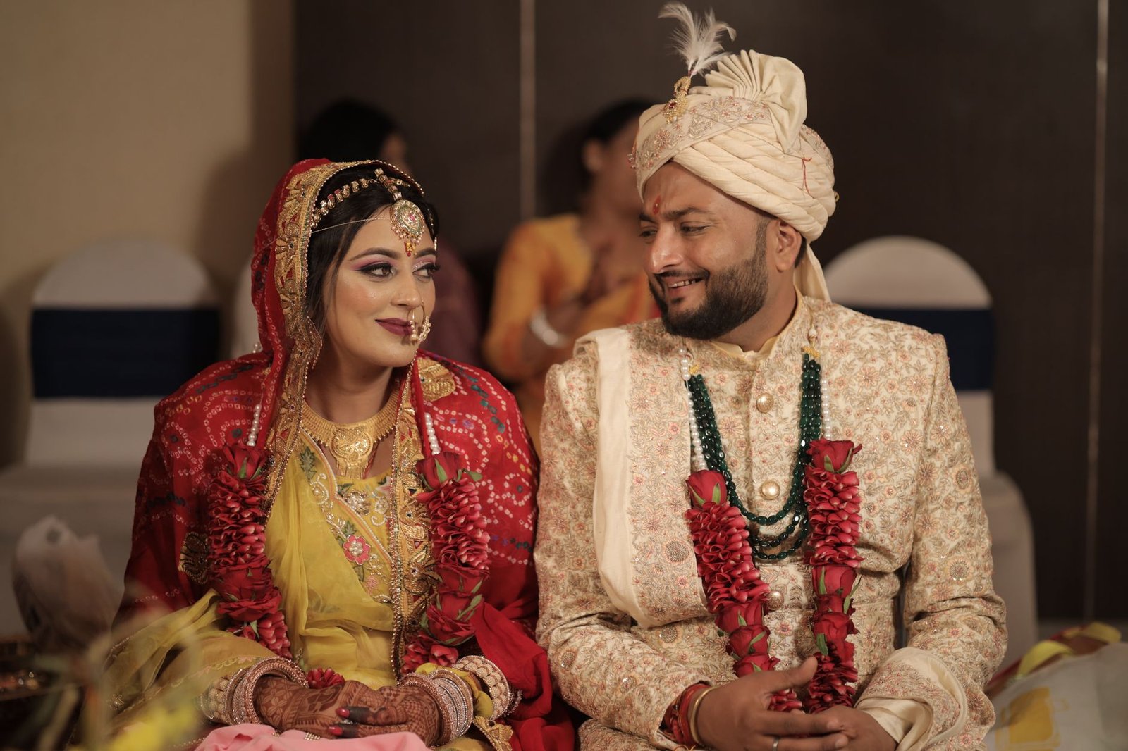 bride and the groom sitting together side by side