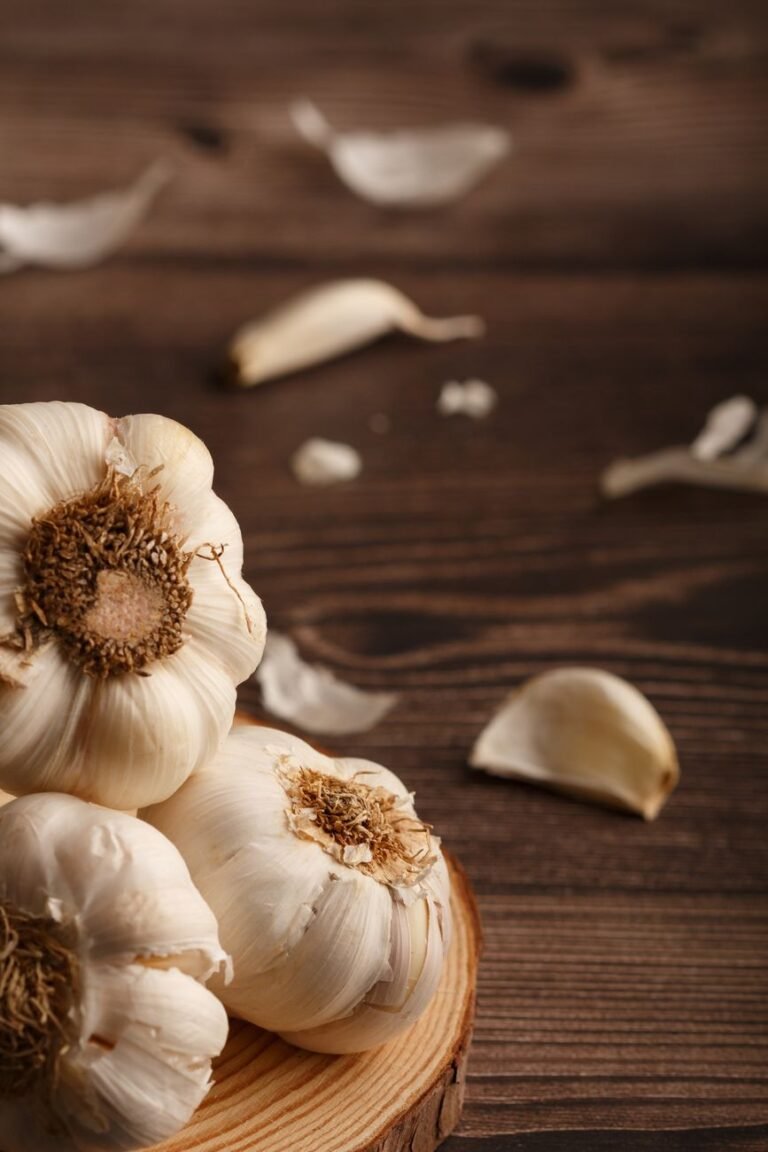 garlic on a wooden counter top
