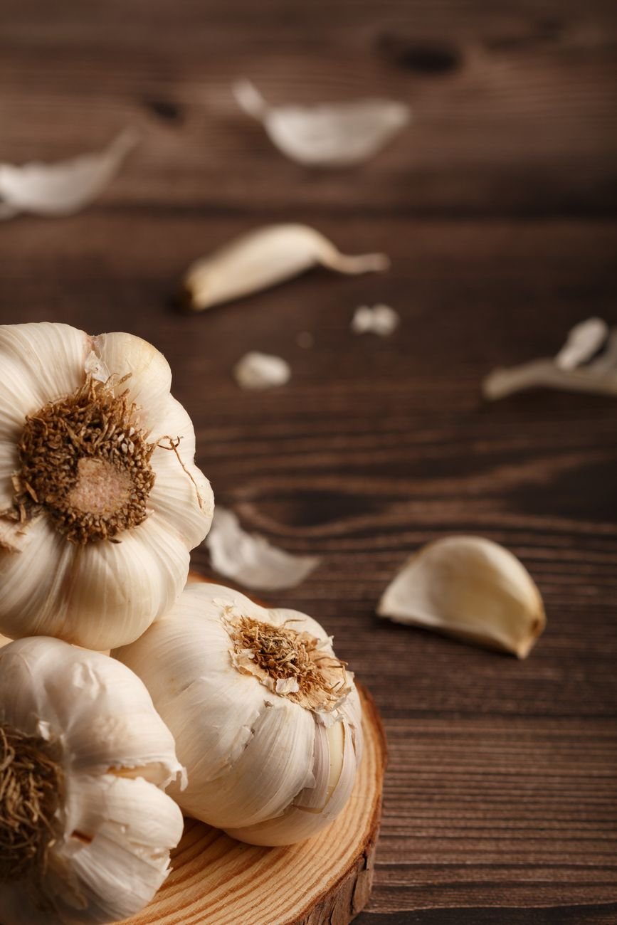 garlic on a wooden counter top
