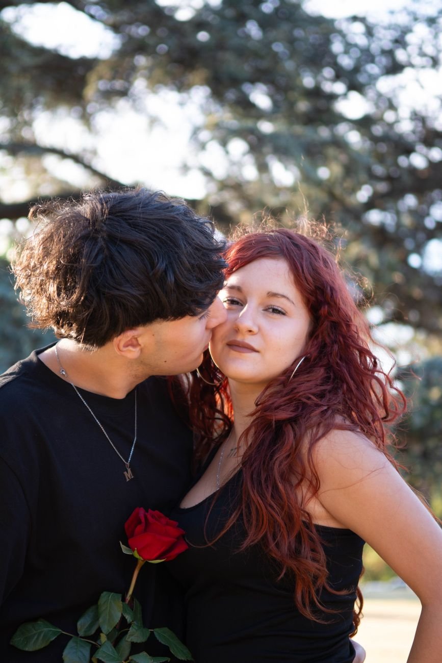 romantic couple sharing a tender moment outdoors