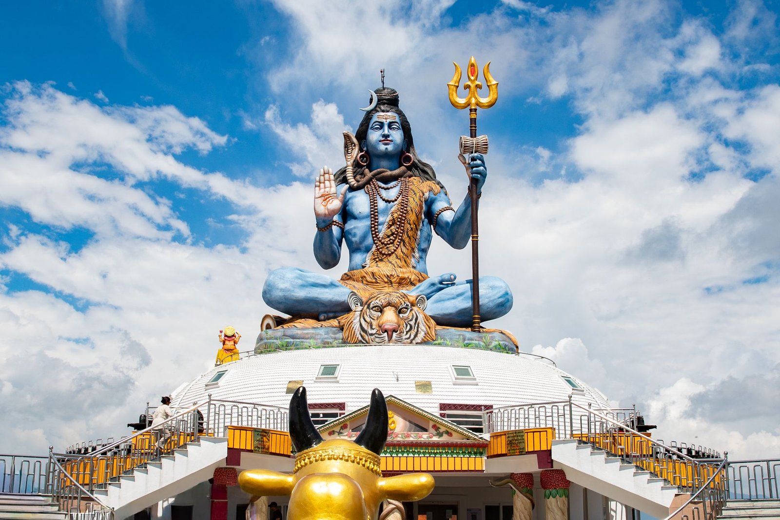 majestic shiva statue in pokhara under blue sky