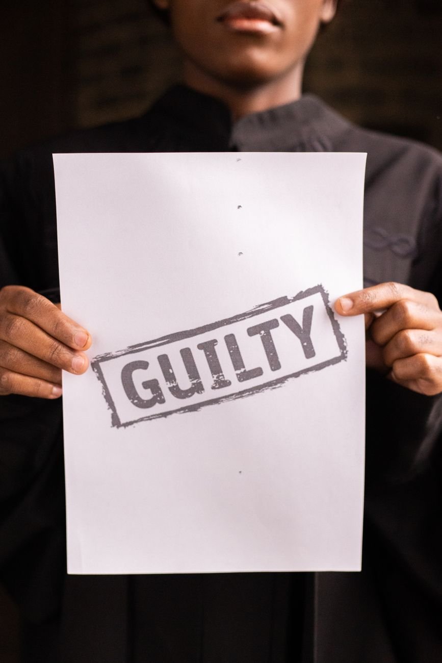 a person holding a paper