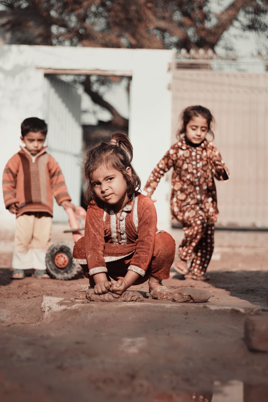 a crouching little girl