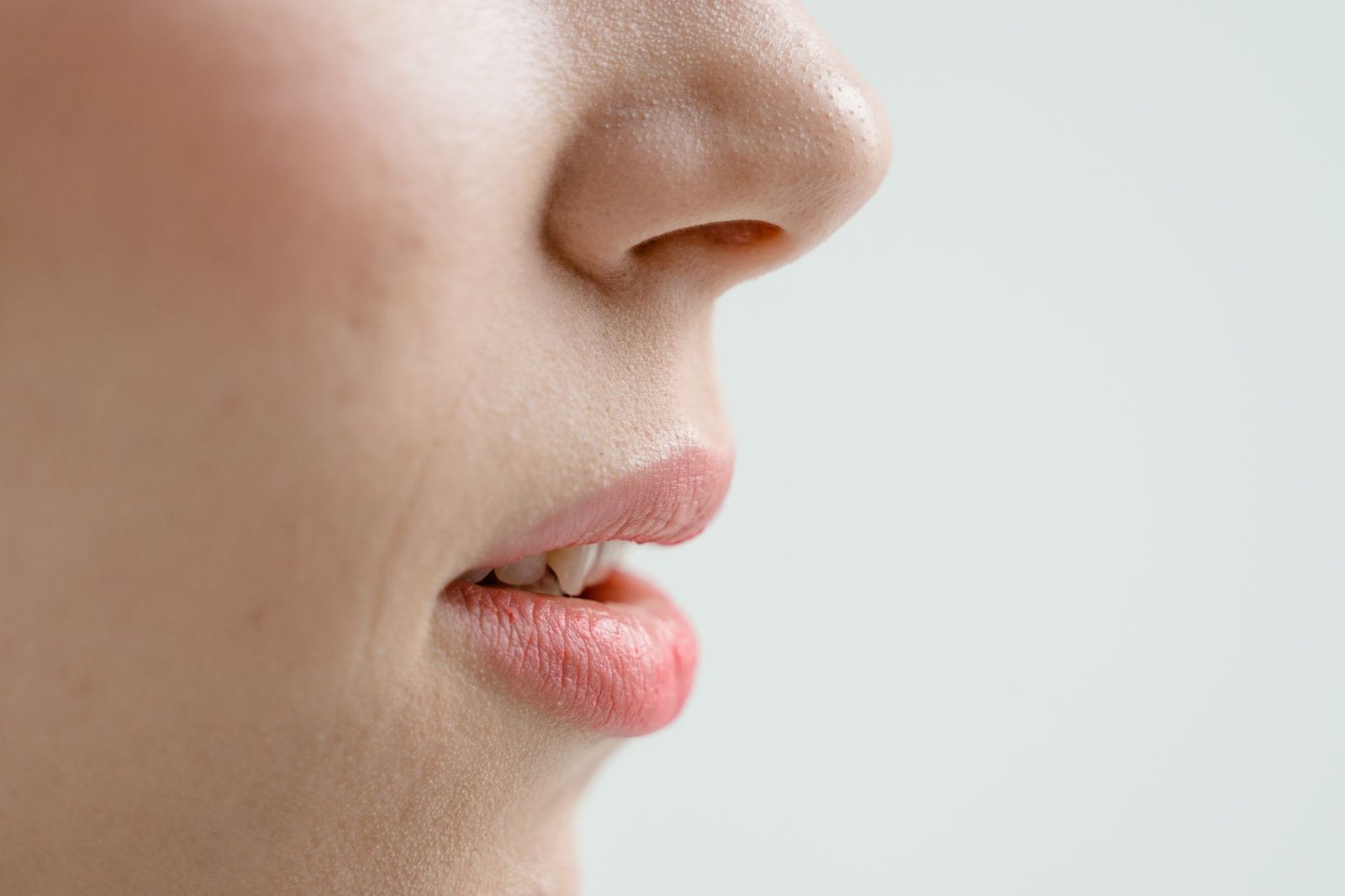 side view of woman s face in close up photography