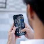 man hands holding smartphone