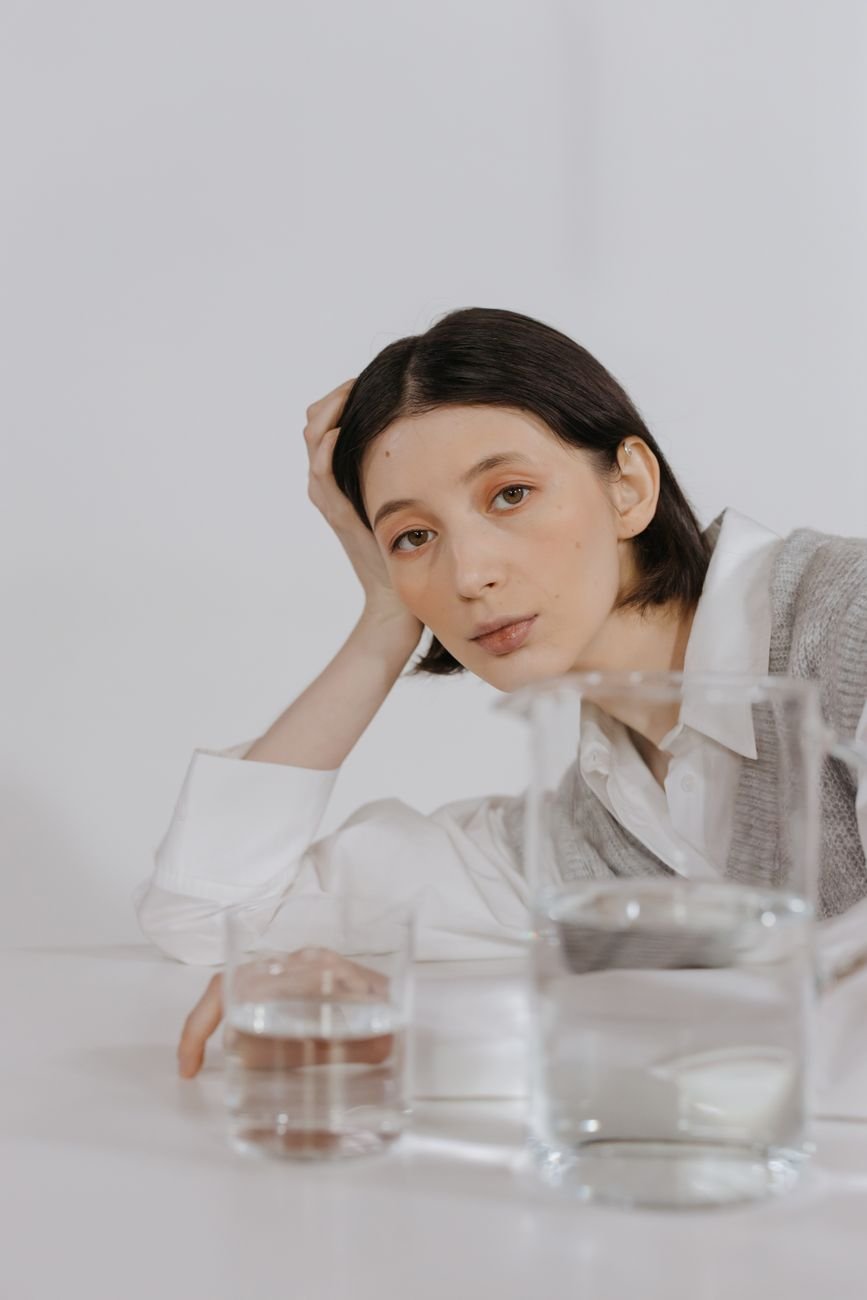 woman in white long sleeve shirt